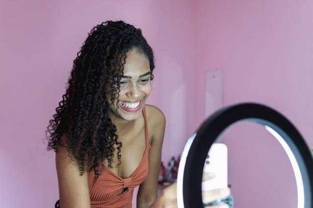 Creator recording video with a ring light